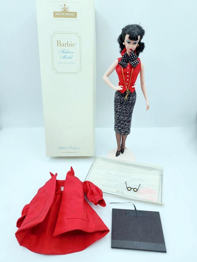 Barbie Silkstone Fashion Designer Barbie Doll: Barbie Silkstone Fashion Designer Barbie Doll, appears to be complete, in original box with COA. These dolls have been gently played with, redressed, and displayed behind glass in a smoke free and pet