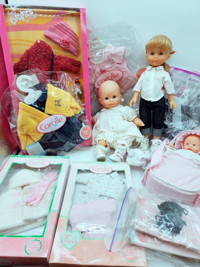 Group of Corolle Dolls and Clothing: Group of Corolle Dolls and Clothing. Includes a 14" Camille Doll dressed in jeans, white shirt and sneakers with the Trendy Set outfit never removed from box. Along with a 13" Corolle Baby Doll with b