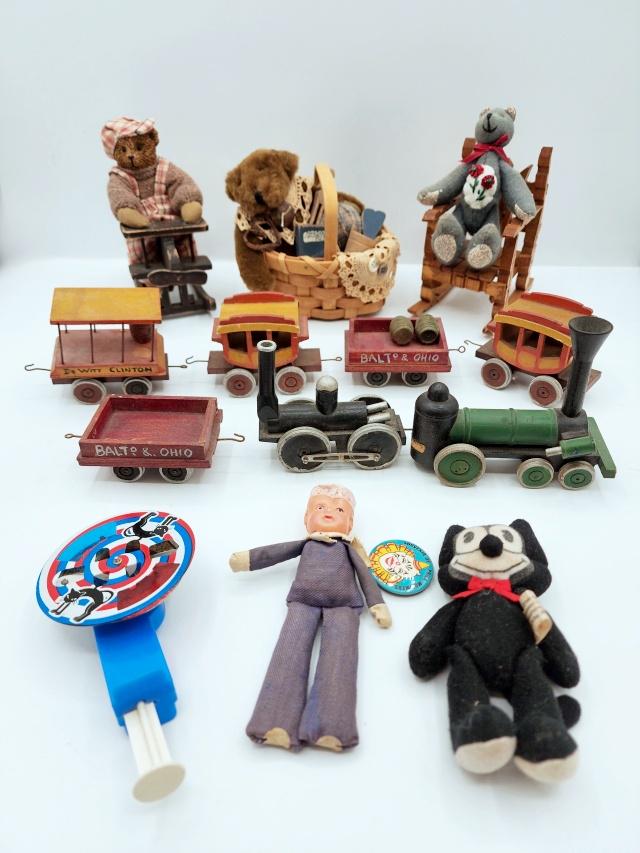 Vintage Toy Group: Vintage Toy Group. 7 Piece Wood Train Set which appears to be hand made with each car measuring between 2.5 and 4". 5" Plush Felix The Cat. 5" small Sailor Doll, marked US Navy with celluloid head, sm