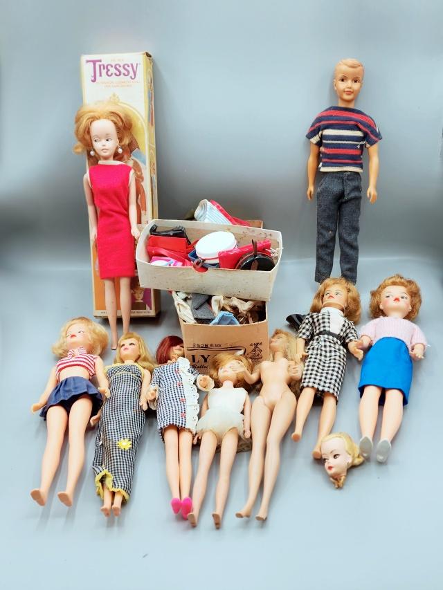 Vintage Doll Group - Tressy, Ted, Barbie and more: Large Group of vintage dolls including Tammy's Family Ted, a 12" Tressy Doll with box, a 9" Tressy Doll, a Treey key, and several outfits for Tressy. a 12" 1964 Ideal Doll )red and white striped top a