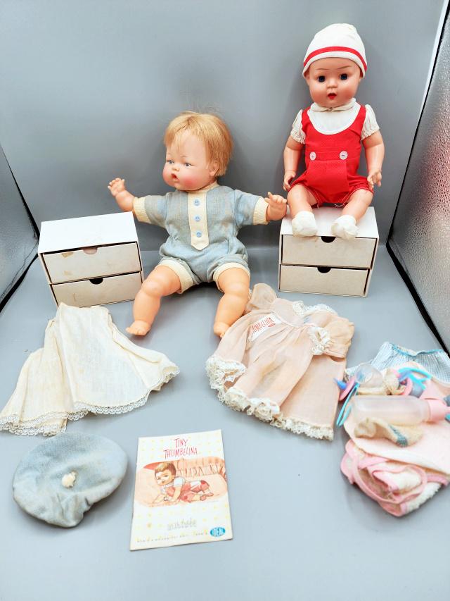 Vintage Ideal Tiny Thumbelina Doll and more: Vintage Tiny Thumbelina doll in blue onesie and comes with many original accessories and paperwork. Mechanism will wind up and is slow to unwind, not sure if it is working like it should. Along with a