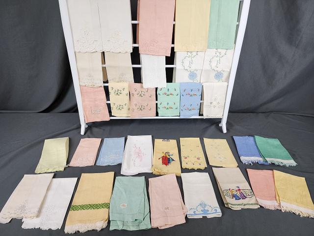 Group of Vintage Fingertip Towels: 34 Vintage Fingertip Towels, mostly linen with 8 pairs and one set of 4. Work includes hand embroidery, hand applique, drawn work, cut work, and more. Motifs include mostly flowers with some figures i