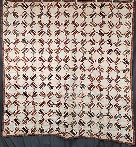 Vintage Feathered X Quilt c1860-1960: Vintage Feathered X quilt measuring 75" x 78". The graphic design is created with a feathered sashing that is 3" wide around a 4" muslin square. It is hand pieced and hand quilted, with an off-white c
