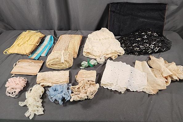 Group of Vintage Lace Trim & More: Group of vintage lace trim and more includes 6 yards of black tulle, black and metallic silver netting, many yards of yellow machine lace, many yards of miscellaneous machine laces and trims, and seve