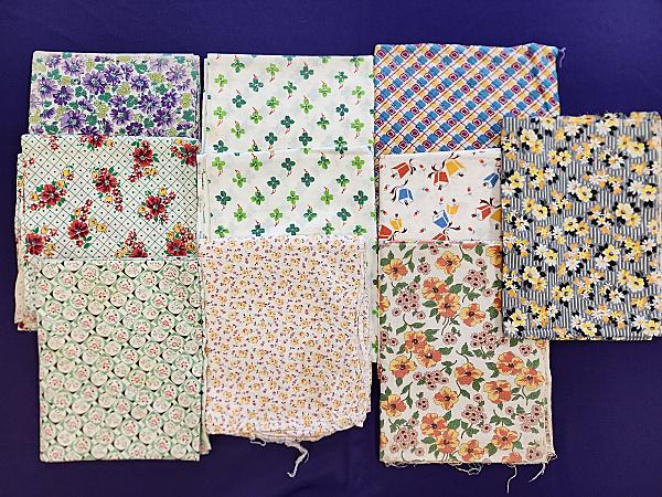 Group 1 of 10 Vintage Cotton Printed Feedsack Bags with flowers,  a pair of 4 leaf clovers, bells (1 of 20)