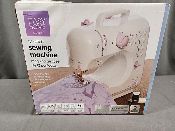 Easy Home Portable Sewing Machine: Easy Home Portable Sewing Machine. 12 stitch sewing machine, runs on AC or 4 AA batteries included, uncludes bobbins, two spools of thread, AC adapter and foot pedal, Tested and works, box and user's