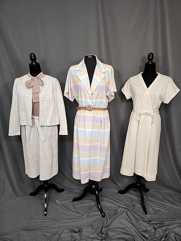 3 Vintage Dresses - Susan Prichard, more: 3 Vintage Dresses. Includes a Susan Richards pastel stripe, poly rayon knit dress. Size 12. Snaps in the front. Belt included may not be original. In very good condition. Along with an ivory polyester