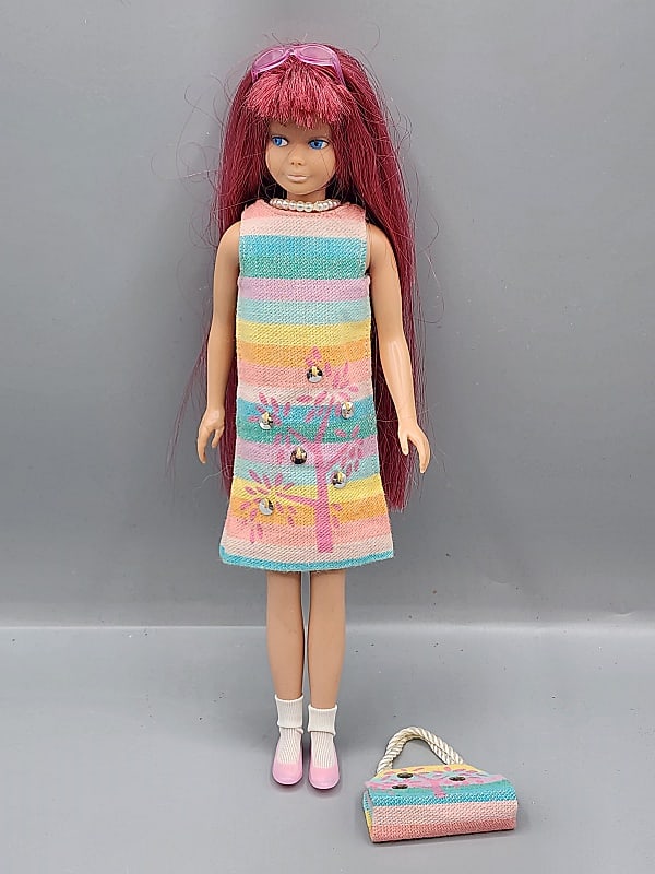 Vintage Original Skipper - Rerooted Pink Hair: Vintage Original Skipper, S/L, has rerooted hair in a pink color. She is in a pastel dress with matching purse, pink shoes, white socks and sunglasses. In good condition with minor marks on her arms a