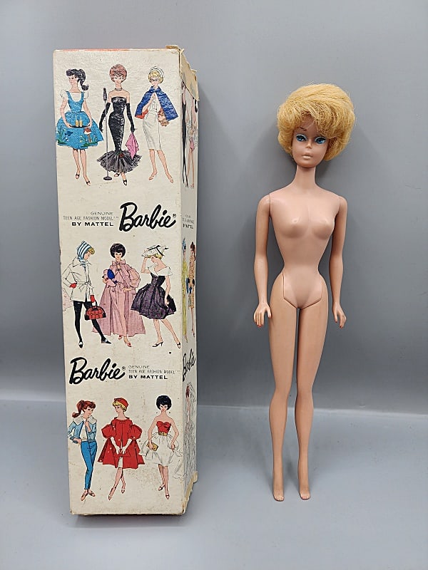 Vintage Barbie in Box - Bubblecut Blonde: Vintage Barbie-Bubblecut Blonde,S/L, Stock #850 imported from Japan with Box but nude with no shoes, stand or paperwork. In good condition with minor marks to arms and legs and tackiness. Box is in fa