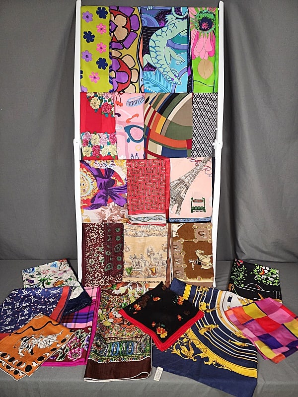 23 Vintage Silk Scarves - Dior, Spade, de la Renta: Group of vintage ladies silk scarves including Escada botanical silk (small spot); silk plaid with floral border by Diane von Furstenberg; silk with Indian ladies dancing and musicians, unsigned; silk