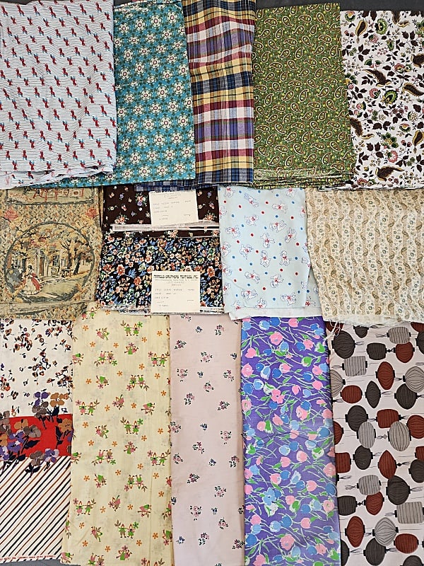 8lbs of Vintage Fabric c1940-1980: 8lbs of Vintage Fabric from 1940-1980. Group includes cotton prints, woven plaids, flannel, and some blends. Includes designs by ,Robarre Fabrics, Cranston, Marcus Bros. Motifs include flower, paper l