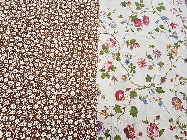 2 Vintage Bloomcraft Floral Fabrics: 2 vintage Bloomcraft floral fabrics. Both are home decor weight cotton fabrics. Off white with a light and airy colorful floral print measures 54" x 8 yards. Along with a brown with white overall flor