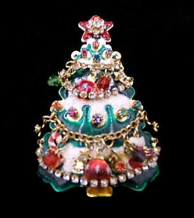 Vintage LATR2GO ''Lunch at the Ritz'' Merry Christmas Tree Brooch/Pendant: Vintage LATR2GO ''Lunch at the Ritz'' Merry Christmas Tree Brooch/Pendant measuring 3.5'' high by just over 2'' wide. Featuring a festive mix of enamel, multi colored rhinestones, and dangling charms.