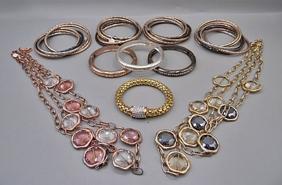 Group of 8 Bangles and 2 Necklaces-Joan Rivers: Group of 8 Bangles and 2 Necklaces by Joan Rivers. The group includes 4 matching sets of 6 intertwined and faceted metal bangles in a mix of silvertone, goldtone, rose gold tone, and gun metal grey. T
