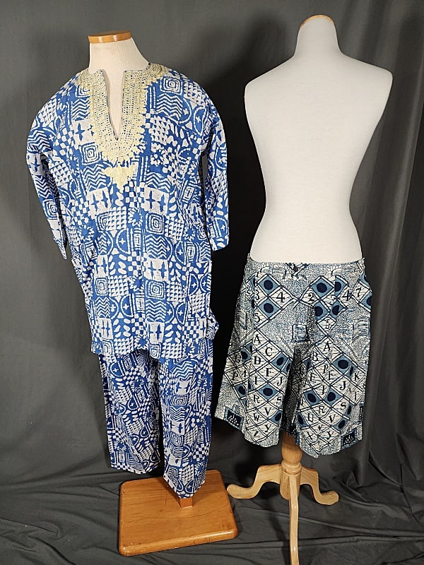 African Mens Tunic, Pants, and Shorts: African Men's Tunic, Pants, and Shorts. Group includes blue and white African batik men's tunic with embroidered collar in front. Tunic has 3/4 sleeves and 3 front pockets with matching drawstring pan