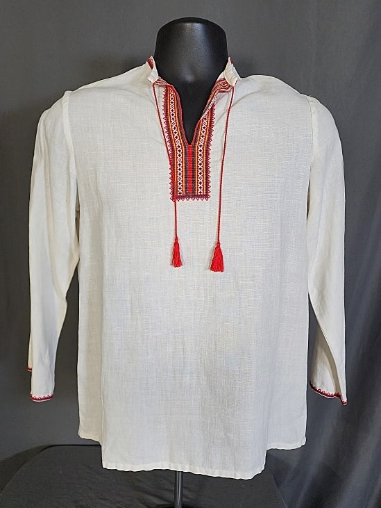 Vintage Linen Ukrainian Shirt: Vintage off white linen shirt believed to be Ukrainian with hand embroidered collar, front, and cuffs. Hand embroidered in bright colors in petti point stitches. Measures flat 19" across chest, 21" sl