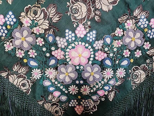Vintage Eastern European Shawl: Vintage Eastern European Shawl. Green Damask shawl measuring 29" x 29". With 10.5" fringe on all sides. One corner is embellished with densely embroidered flowers. In good condition with no issues not