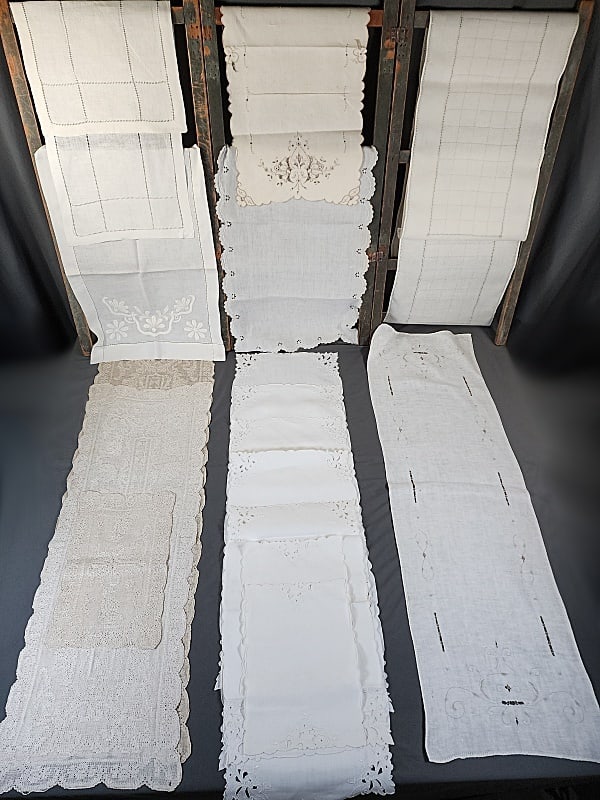 18 Vintage Linen Dresser Scarves, Runners: 18 Vintage Linen Dresser Scarves or Runners including a set of 3 with drawnwork, 2 pairs with drawnwork, a set of 7 with hand embroidery and cutwork, and 4 singles with hand embroidery. All in good co