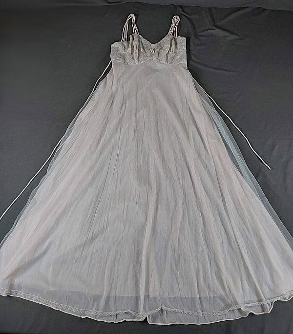 Pink Vintage Nightgown: Pink vintage nightgown from Bonwit Teller with spaghetti straps, lace bodice and lace hem. Small tear near bottom and rosettes need reinforcing. If you have any doubt, please ask questions! We will pr