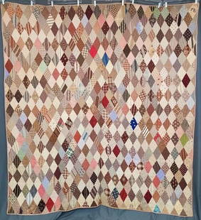 Antique c1880 Hit or Miss Charm Quilt: Antique c1880 Hit or Miss Charm Quilt measuring 86x79 inches. Comprised of 668 3.5 inch diamonds, all a different fabric making this a charm quilt. It is hand pieced and hand quilted. It has a