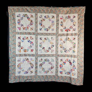 Vintage c1940 Baby Bunting Quilt Top: Vintage c1940 baby bunting quilt top measuring 70" x 71". It is comprised of 9 blocks, 17" x 17", set straight, 3x3 with 2 1/2" floral print sashing and 5 1/2" border. It is machine pieced. It is