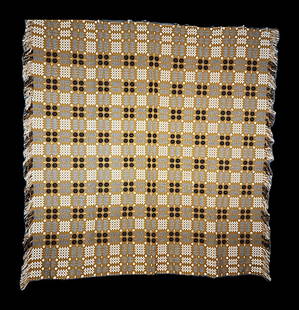 Vintage c1960s Welsh Wool Coverlet: Vintage c1960s Welsh Wool Coverlet measuring 88 x 93 inches. Woven geometric motifs in gold, black, and white. Reversible with a light side and a dark side. It is in good condition with just a full a