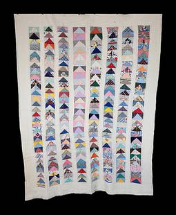 Vintage c1940 Flying Geese Quilt: Vintage c1940 Flying Geese Quilt measuring 67x86". It is comprised of 8 vertical bars of flying geese, 4.5" wide, with 2.25" wide white alternating bars, and 6.5" white border. It is hand and machine