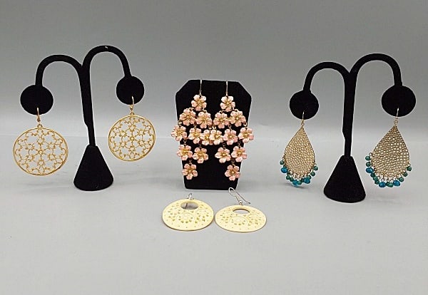 4 Pairs of Statement Earrings-Joan Rivers and More: Group of 4 Pairs of Statement Earrings-Joan Rivers and More. The group includes 1 pair of goldtone circular front facing earrings featuring filigree centers by Joan Rivers. As well as lever back hook 