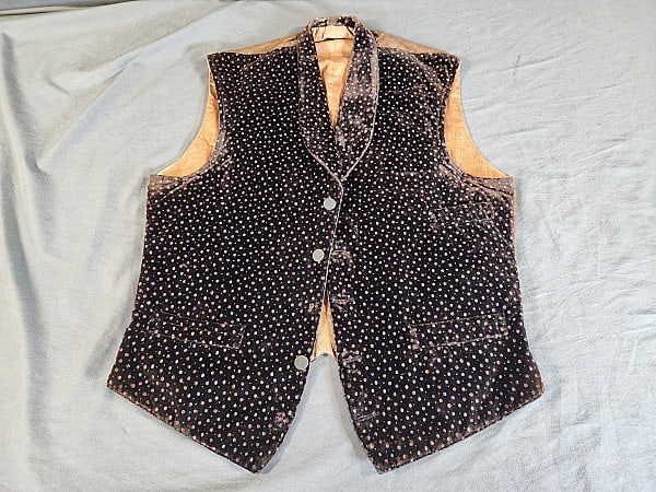 Antique 19th Century Mens Velvet Waistcoat: Antique 19th Century Mens Velvet Waistcoat. This cheeky antique mens 5 button waistcoat features a black silk velvet front with a multicolor polka dot pattern in shades of peach, turquoise, brown, and