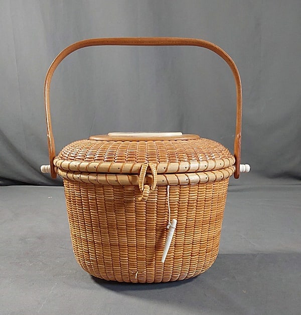 Handmade Maritime Ratan Basket Purse c2000: Handmade Maritime Ratan Basket Purse c2000. This vintage basket purse features an oval hard body with a domed lid inset with an oval plastic faux scrimshaw disc with the image of old ships in a harbor