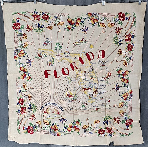 Vintage Souvenir Printed Tablecloth - Florida: Vintage Souvenir Printed Tablecloth -Florida The Sunshine State, 44x46", linen. In poor condition with small spots and storage discoloration, and a tear in the border edge. From the estate of Sharon S