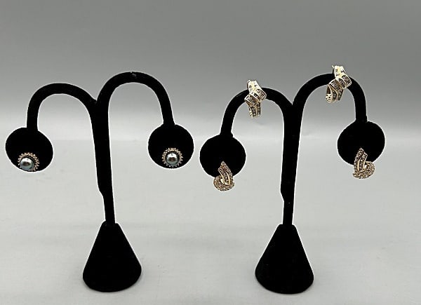 2 Pairs of Gold and Diamond Accented Earrings and More: 2 Pairs of Gold and Diamond Accented Earrings and More. The pairing includes 1 pair of 10K yellow/white gold earrings with posts and snap lever backs. They feature a mix of .5mm-1mm round and baguette