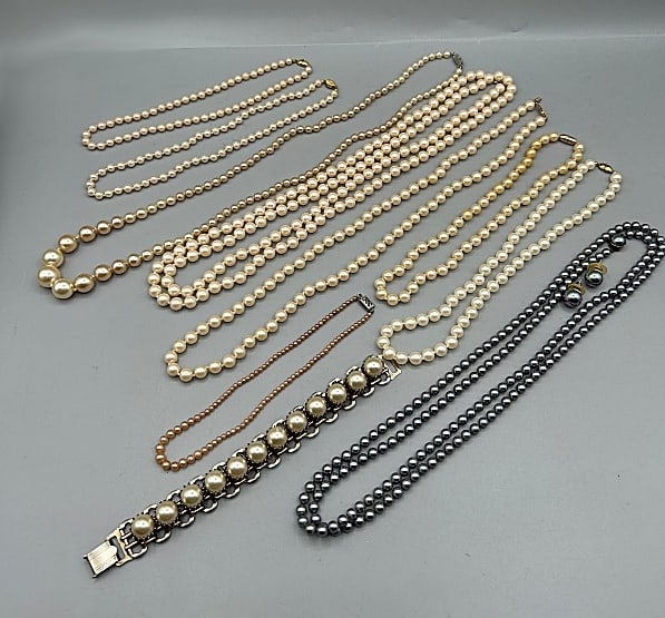 Large Lot of 11 Pieces Faux Pearl Jewelry-Vintage and More: Large Lot of 11 Pieces Faux Pearl Jewelry-Vintage and More. The group includes 1 50'' long 5mm grey faux pearl necklace, in good condition. 1, 55'' long ivory 8mm faux pearl necklace, in good conditio