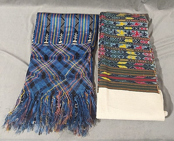 2 Vintage Mexican South American Shawls: Pair of 2 Vintage Mexican/South American Shawls. The pairing includes 1 vintage long cotton canvas shawl featuring 2 large portions of skillfully embroidered motifs in a mix of people, animals, and ge