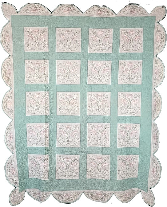 Vintage c1940 Lily Pad Embroidered Quilt: Vintage c1940 Water Lily Pad Embroidered Quilt measuring 74x86". It is comprised of 20 blocks, 10.5x10.5", set straight, 4 by 5, with 3" green sashing, a 5.5" green inner border, and a 5.5" white scal