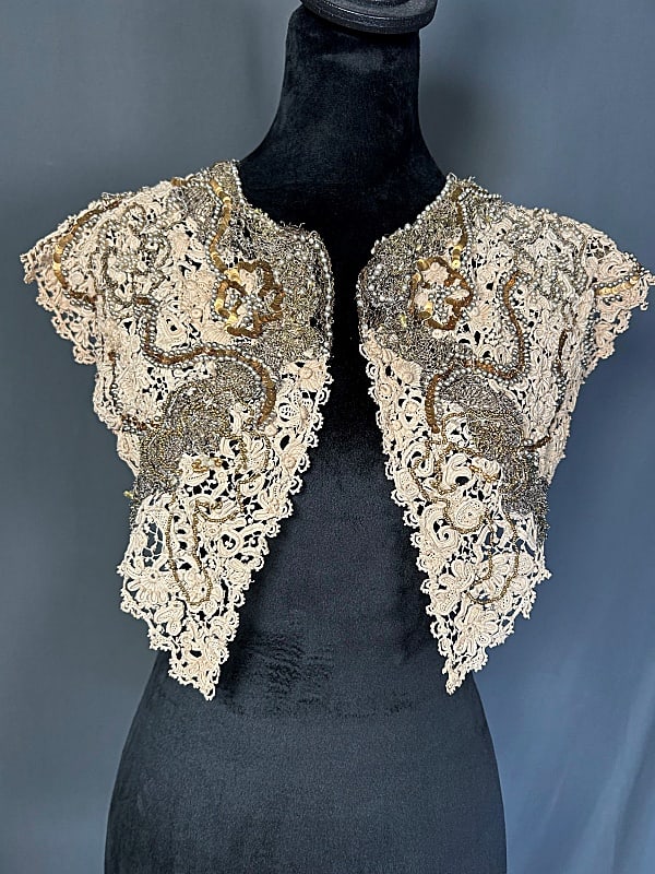 Late 19th Century Nightgown and Lace Mantle: Late 19th Century Nightgown and Lace Mantle. The pairing includes a late 19th century nightgown and lace mantle. Featuring 1 fine cotton sleeveless nightgown with a V front neckline with a keyhole and
