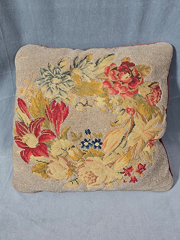 1 Antique Floral Embroidered Beaded Pillow: 1 Antique Floral Embroidered Beaded Pillow. The lot includes 1 antique floral embroidered beaded pillow featuring a colorful wreath of embroidered flowers on a clear glass beaded ground with a burgund