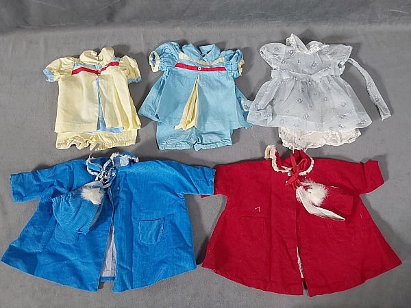 Vintage Chatty Cathy Clothing: Chatty Cathy Clothing, commercially made outfits. Good condition, some fraying at hems and sleeves. The outfits include 2 capes with hoods, 2 rompers and one sheer dress with pantaloons. If you have a