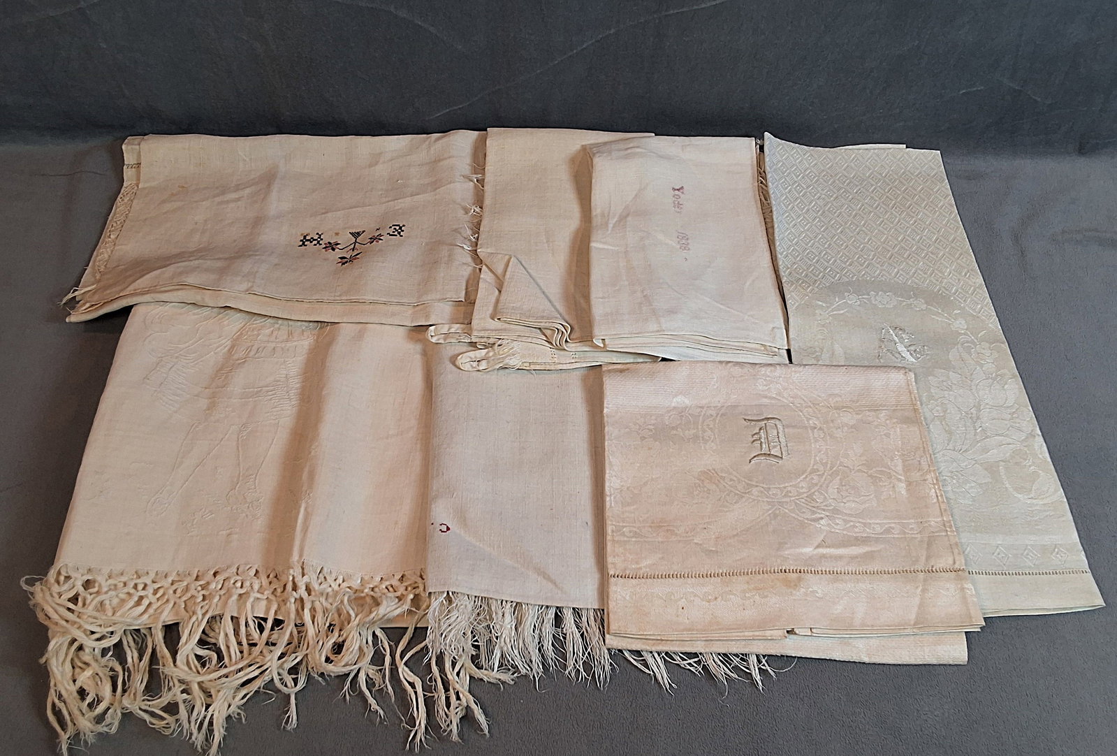 7 Antique Linen Towels With Embroidery Accents: 7 Antique Linen Towels With Embroidery Accents. The lot includes a mix of 7 antique linen towels with embroidered accents. Featuring 2 antique linen huck towels with embroidered D monograms. A pair of