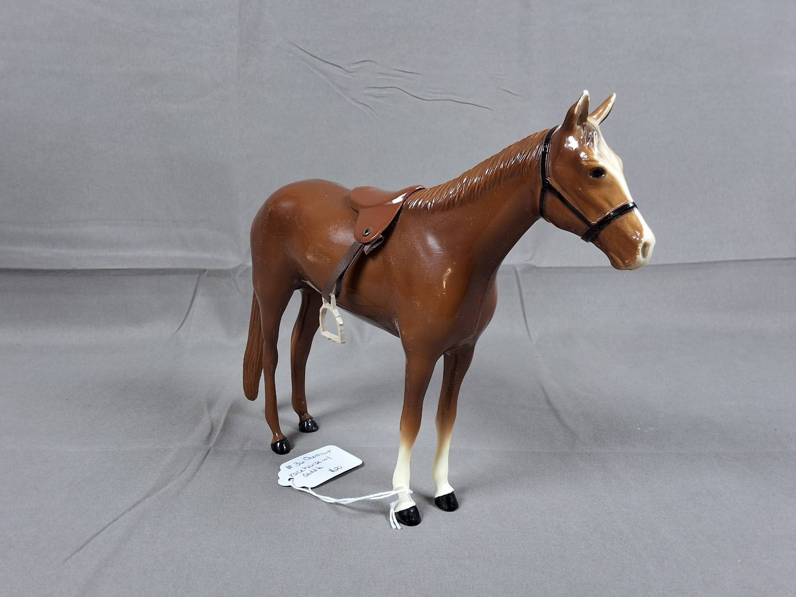 Breyer #36 Race Horse 1960-1967 - Glossy Chestnut: Breyer #36 Race Horse model produced between 1960 and 1967, featuring a glossy chestnut finish with a bald face, mane and tail matching the body color, various stockings, and a black halter. Included 