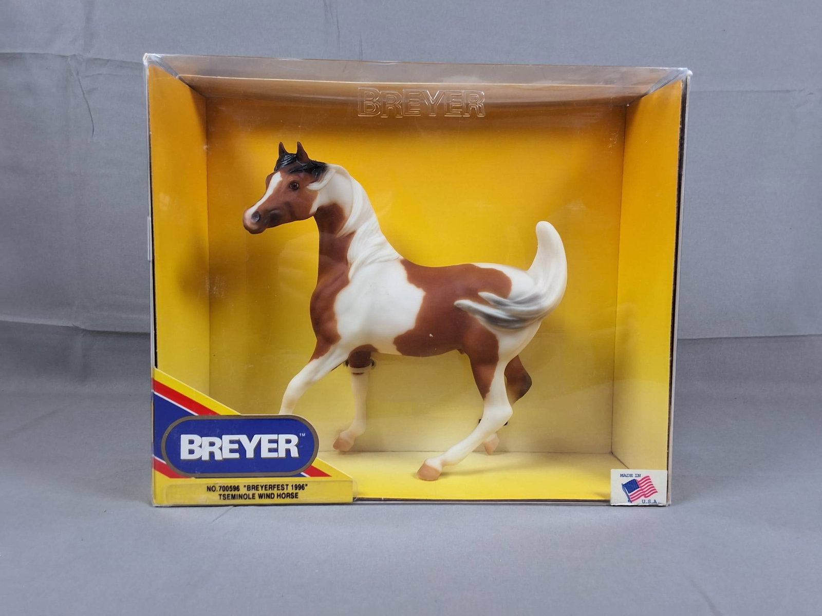 Breyer #700596 Tseminole Wind 1996 - Sham Celebration Model Brown and White: Breyer #700596, Tseminole Wind, Sham Celebration Model from 1996 in brown and white. Limited to 3,800 pieces, this model remains attached in the original box. The box exhibits some wear but retains it