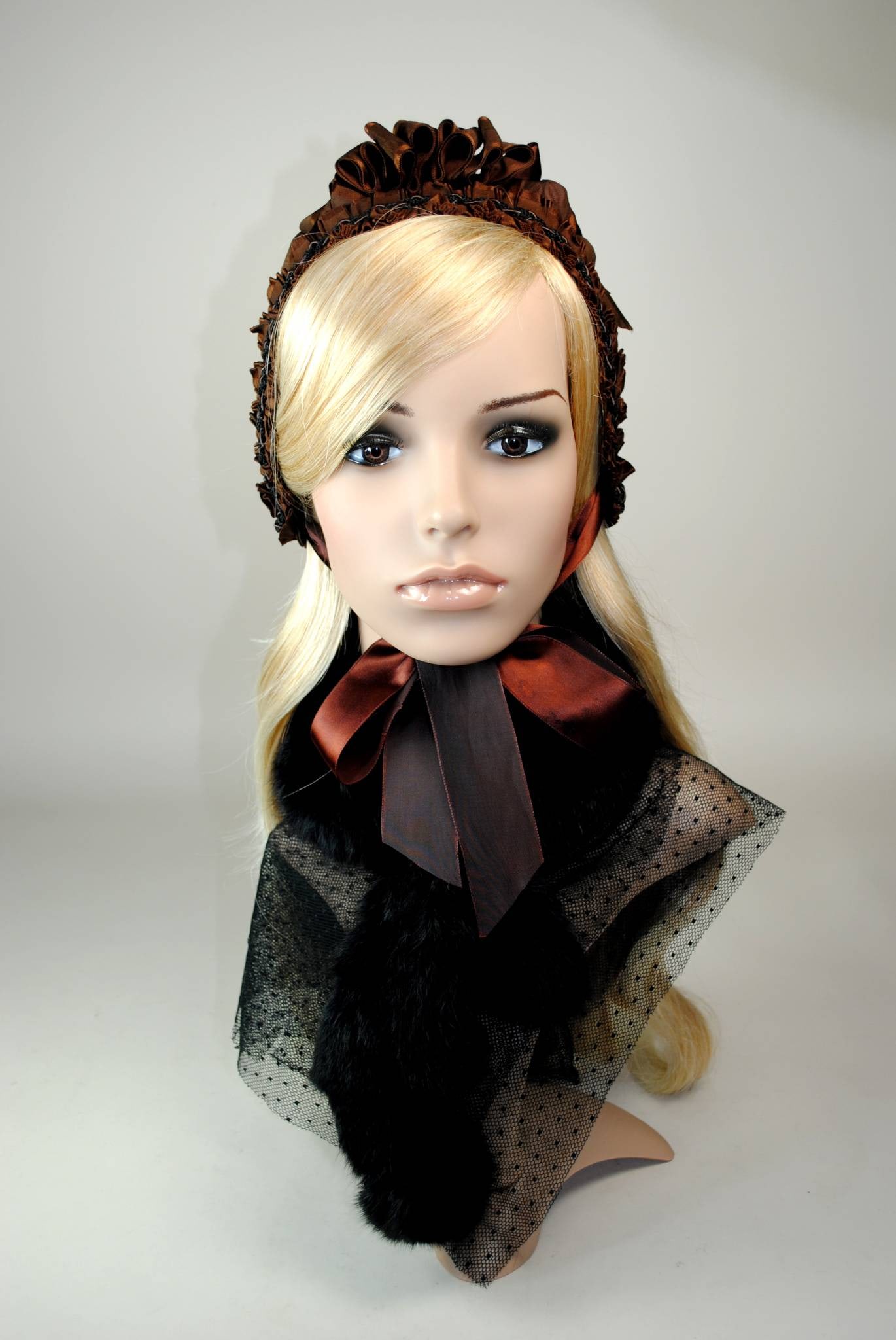 Antique Restored Sild Faille Cap: Antique brown, soft silk faille cap that is lightly padded and lined with black silk taffeta. The cap also features a brown grosgrain ribbon and mahogany red satin ribbon trim, along with ties. This a