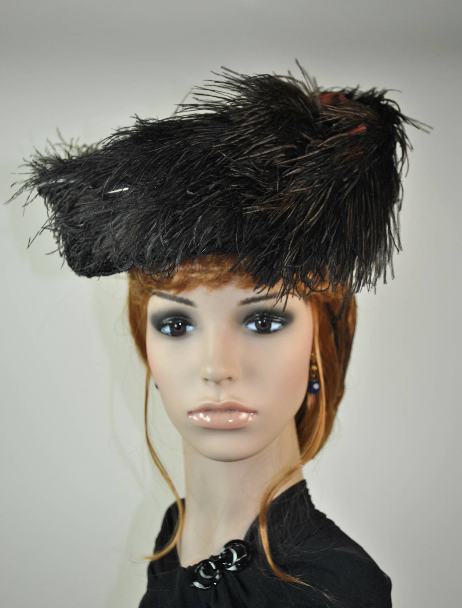 Antique Straw Perching Hat - Ostrich Plume: Dating approximately to 1908, this antique perching hat features a fine black straw braid constructed over a wire frame and is adorned with a brown and tan natural ostrich plume, paired with rose/rust