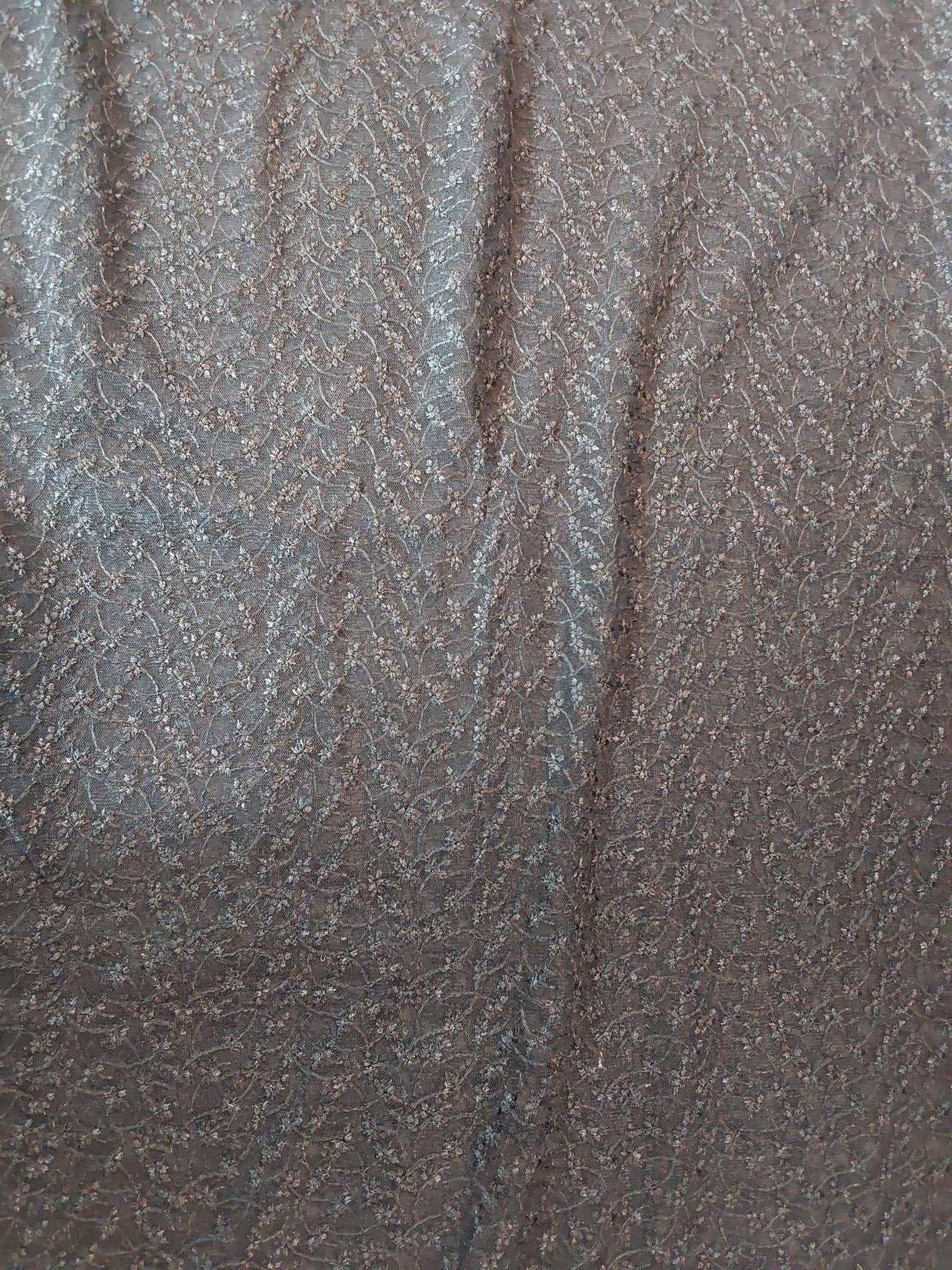 Vintage Tulle Fabric - Embroidered Florals: Vintage tulle fabric measuring 42inx102in in black. Features closely packed embroidered floral motifs in black thread. The fabric is in good condition, suitable for various uses or collections. Please