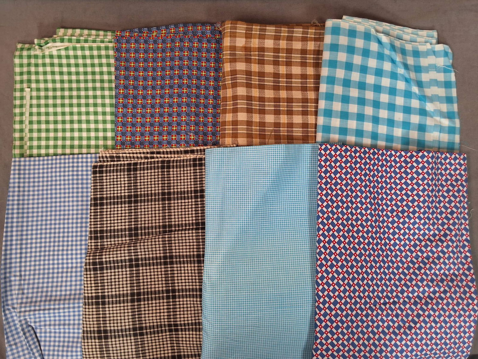 Vintage Cotton Fabric - Plaids: Vintage cotton fabric lot featuring eight pieces weighing 3.02 lbs. Includes measurements: 72in by 216in, 35in by 59in, 36in by 144in, 35in by 38in, 36in by 129in, 38in by 145in, 32in by 72in, and 31i