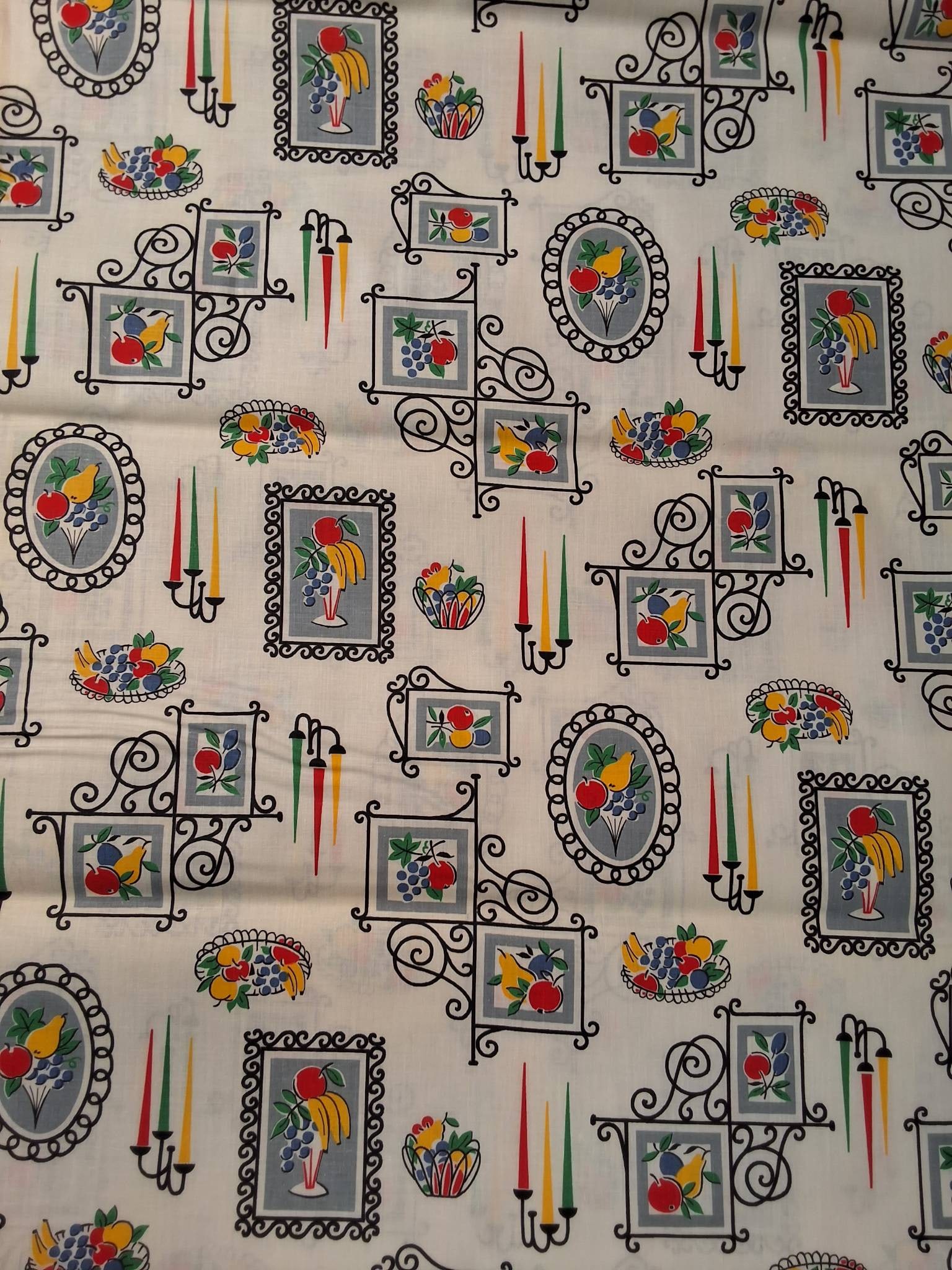 Vintage Cotton Fabric - Fruits and Candles: Vintage cotton fabric measuring 36inx472in features a white background adorned with artistic paintings of fruit collections in frames. The frames incorporate sinuous and straight lines and showcase gr