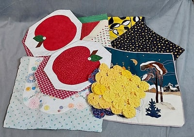 11 Assorted Quilt-Related Fabric Pieces