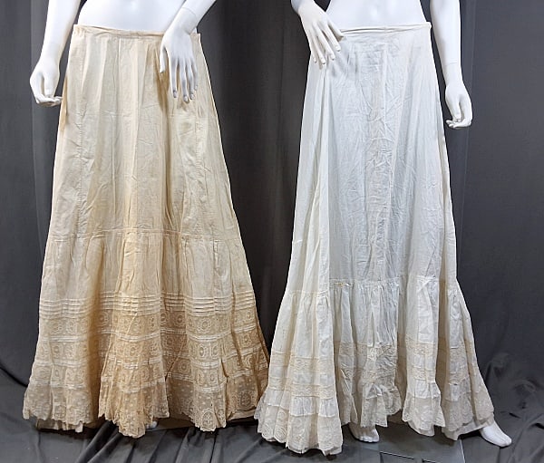 2 19th Century Linen Petticoats: 2 19th Century Linen Petticoats. The lot includes 2 19th century linen petticoats. Featuring a late 19th century white linen petticoat featuring a double layered bottom flounce with the top layer havi