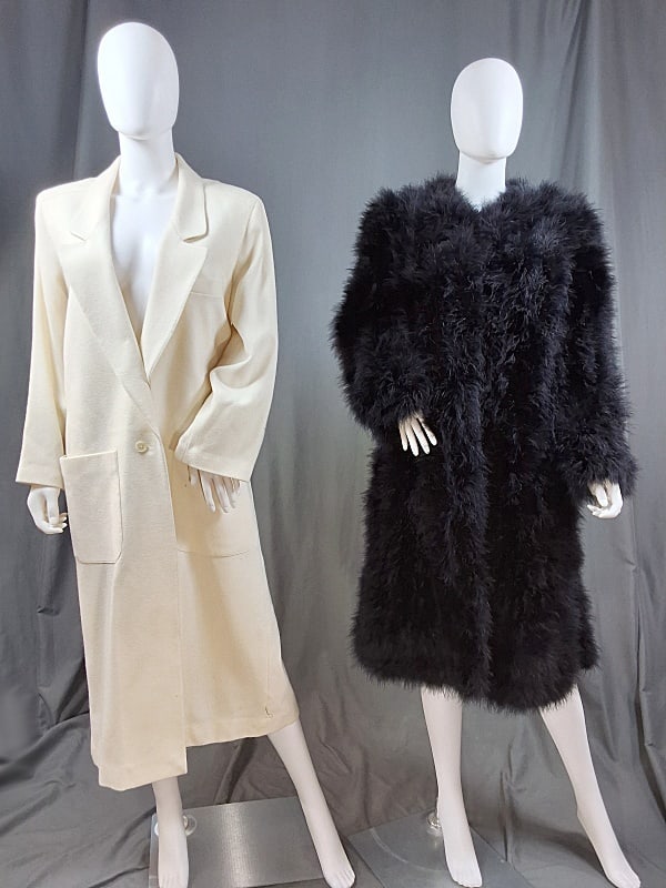 Black Marabou Feather Coat and More: Black Marabou Feather Coat and More. The lot includes a pair of coats. Featuring a unisex full length black marabou feather coat with hook and eye closures down the front. Laying flat it measures: Sho