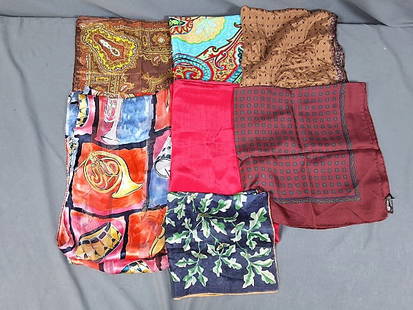 Assortment of 9 Silk Scarves: Assortment of Silk Scarves. The lot contains nine silk and silk-blend scarves in various sizes and patterns. Featured in this lot are nine silk scarves of various sizes with several of them being from